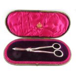 A cased pair of silver grape shears, Elkington & C