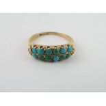 A turquoise set ring, indistinct marks,