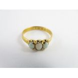 A 22 carat gold three stone opal ring,