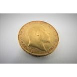 An Edward VII 1906 full gold sovereign