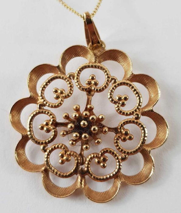 A 9ct gold open work flower pendant and a pair of - Image 2 of 7