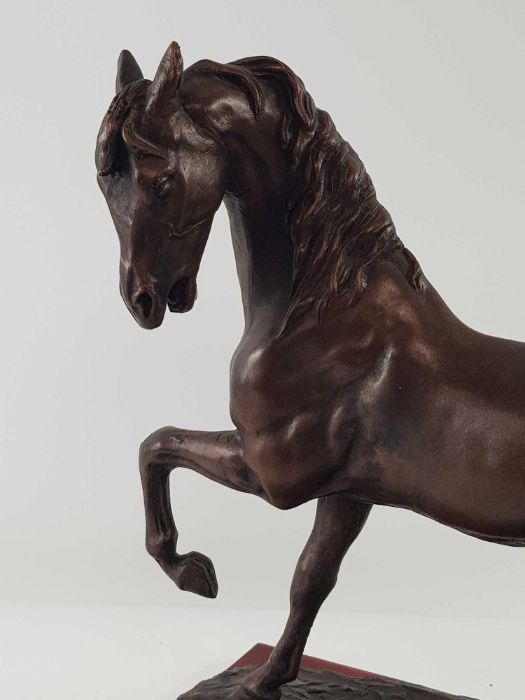 A large bronzed model of a galloping horse, standi - Image 2 of 2