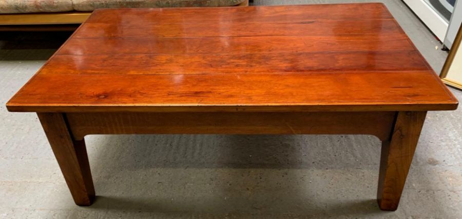 A 20th century elm coffee table, with a polished s