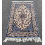 A wool Isfahan rug, with a light blue ground, deco