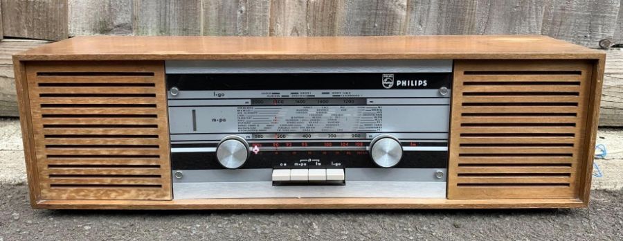 A vintage Phillips radio in a teak surround