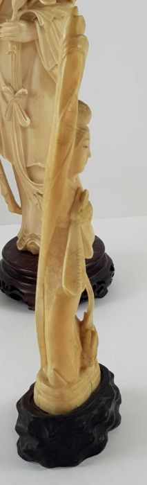 A Japanese ivory carved figure of a lady holding f - Image 9 of 20