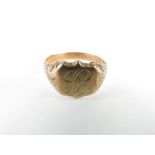 A signet ring with a shield shaped head, the head