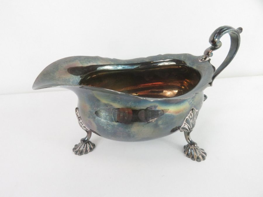 A silver sauce boat, on three splayed feet, Birmin