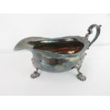 A silver sauce boat, on three splayed feet, Birmin