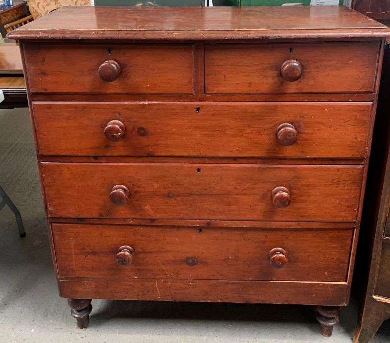A 20th century pine chest of drawers, of three lon