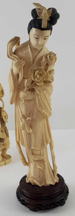 A Japanese ivory carved figure of a lady holding f - Image 11 of 20