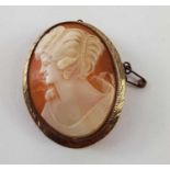 A 9ct gold orange shell cameo brooch, 4.2cm long