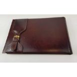 A Rolex leather covered note pad