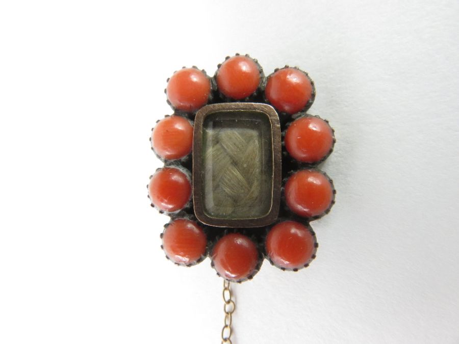 A Victorian mourning brooch with a central glazed - Image 4 of 5
