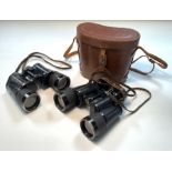 Leather cased binoculars 7 x 50, numbered 218879 G