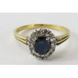 A sapphire and diamond cluster ring, the oval shap