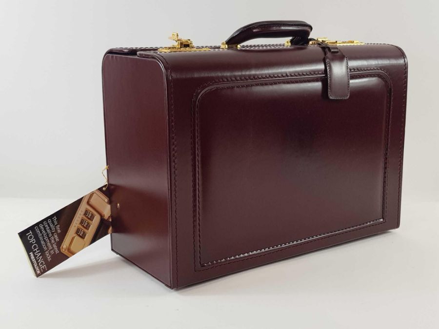 An unused brown leather doctors briefcase