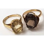 Two 9ct gold dress rings, one set with a smokey qu