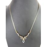 A 9ct gold diamond set necklet, 45cm long, 6.36g g