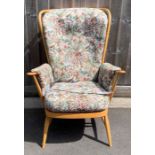 An mid century elm and beech Ercol open armchair