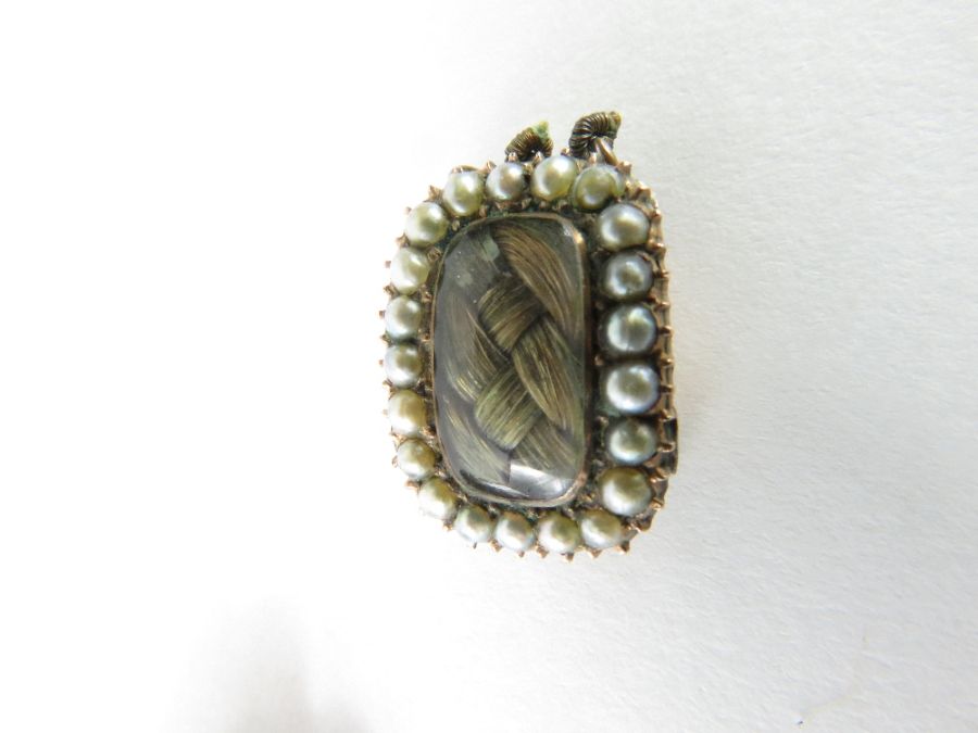 A Victorian mourning brooch with a central glazed - Image 5 of 5