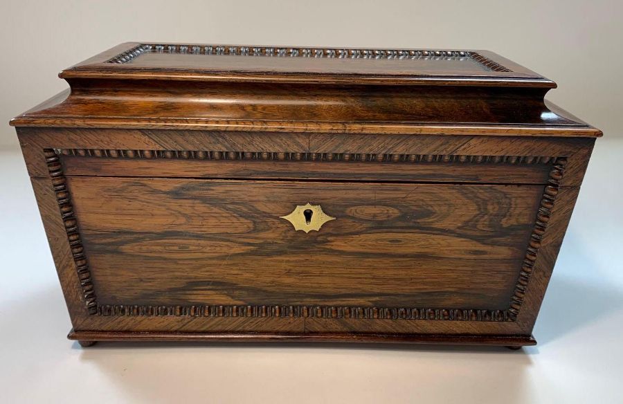 A 19th century rosewood sarcophagus tea caddy, wit