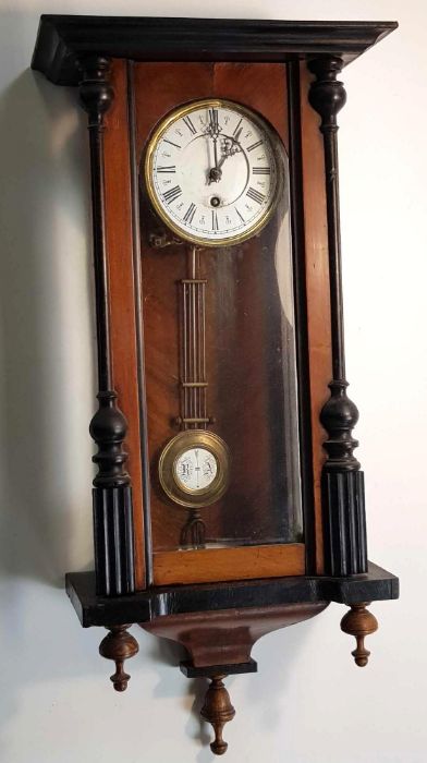 A Vienna regulator clock, in a walnut case
