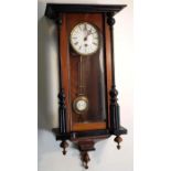 A Vienna regulator clock, in a walnut case