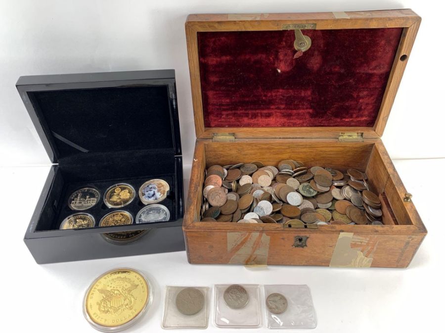 A collection of coins, mostly 20th century example