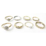 Five 9ct gold rings variously set with diamonds an