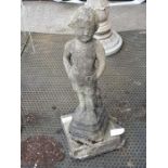 Reconstituted stone figure of a boy