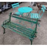 Metal bistro table with 2 chairs along with a cast