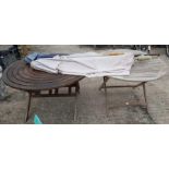 2 hardwood round garden tables along with 2 paraso