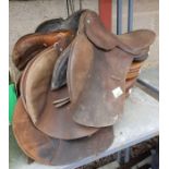 3 leather horse saddles
