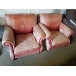 Pair of leather upholstered armchairs