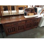 Large Thomasville oak sideboard along with a dress