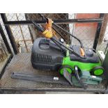 An electric lawn mower along with a Black & Decker