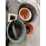 Large copper bucket with iron handle along with a