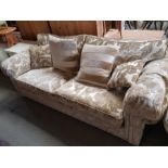 Large cream & beige upholstered settee made by "Dure