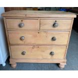 A Victorian pine chest of two short and two long drawers