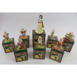 A collection of Royal Doulton Snow White and the S