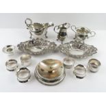 A collection of silver items to include a sauce ju