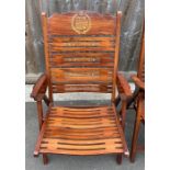A set of six rosewood folding chairs, each with an