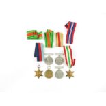 A collection of WWI and WWII medals to include a V