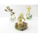 A Royal Worcester figure 'Woodland Dance'; and two