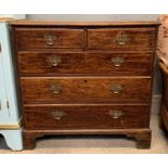 A 19th century oak chest of drawers, of two short