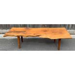 A 20th century yew wood table, 40cm high, 141cm lo