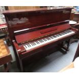 A 20th century Steinway & Sons upright piano seri