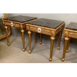 A pair of low side tables in the French style, the