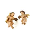 A pair of mid century painted plaster figures of Pu